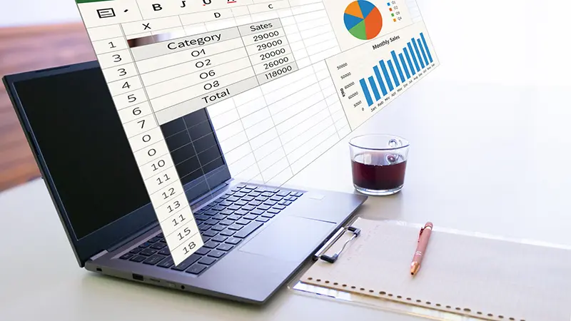 基盤整備：会計ソフト導入代行イメージ/パソコンの上にグラフをイメージ挿入